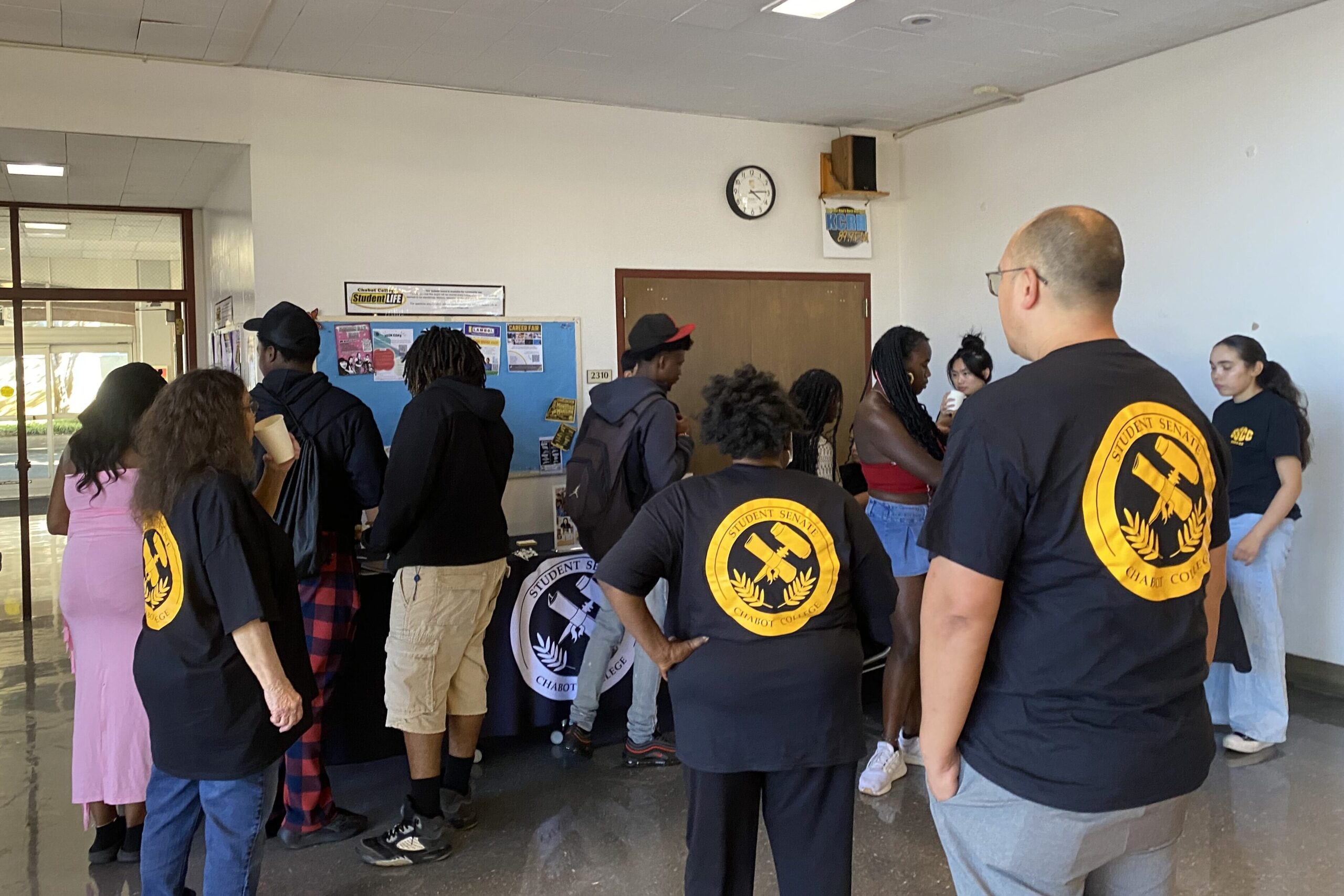 Group of people gathered around a table